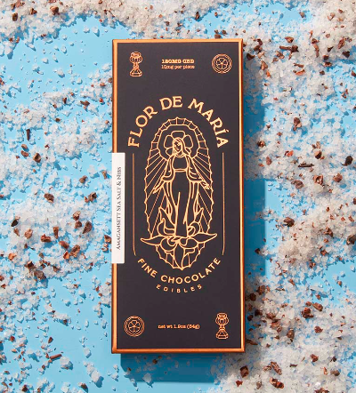 dark chocolate cbd bar on a blue background